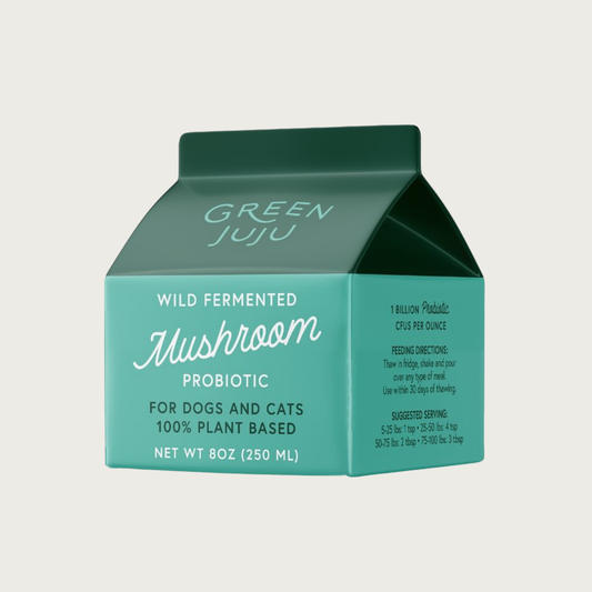 Green Juju liquid mushroom probiotic for dogs and cats, in an 8 ounce carton. 100% plant based and made with wild-fermented mushrooms.