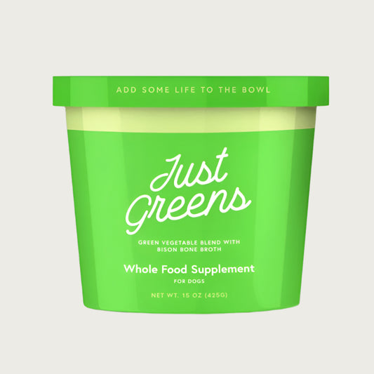 Green Juju Just Greens frozen green vegetable blend with bison bone broth, whole food supplement for dogs in a 15 ounce carton.