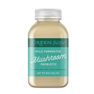 Green Juju liquid mushroom probiotic for dogs and cats, in an 8 ounce bottle. 100% plant based and made with wild-fermented mushrooms.