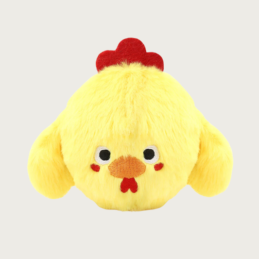 Yellow, round plush dog toy that looks like a chicken, with wings, a red comb on its head and cute embroidered facial expression.
