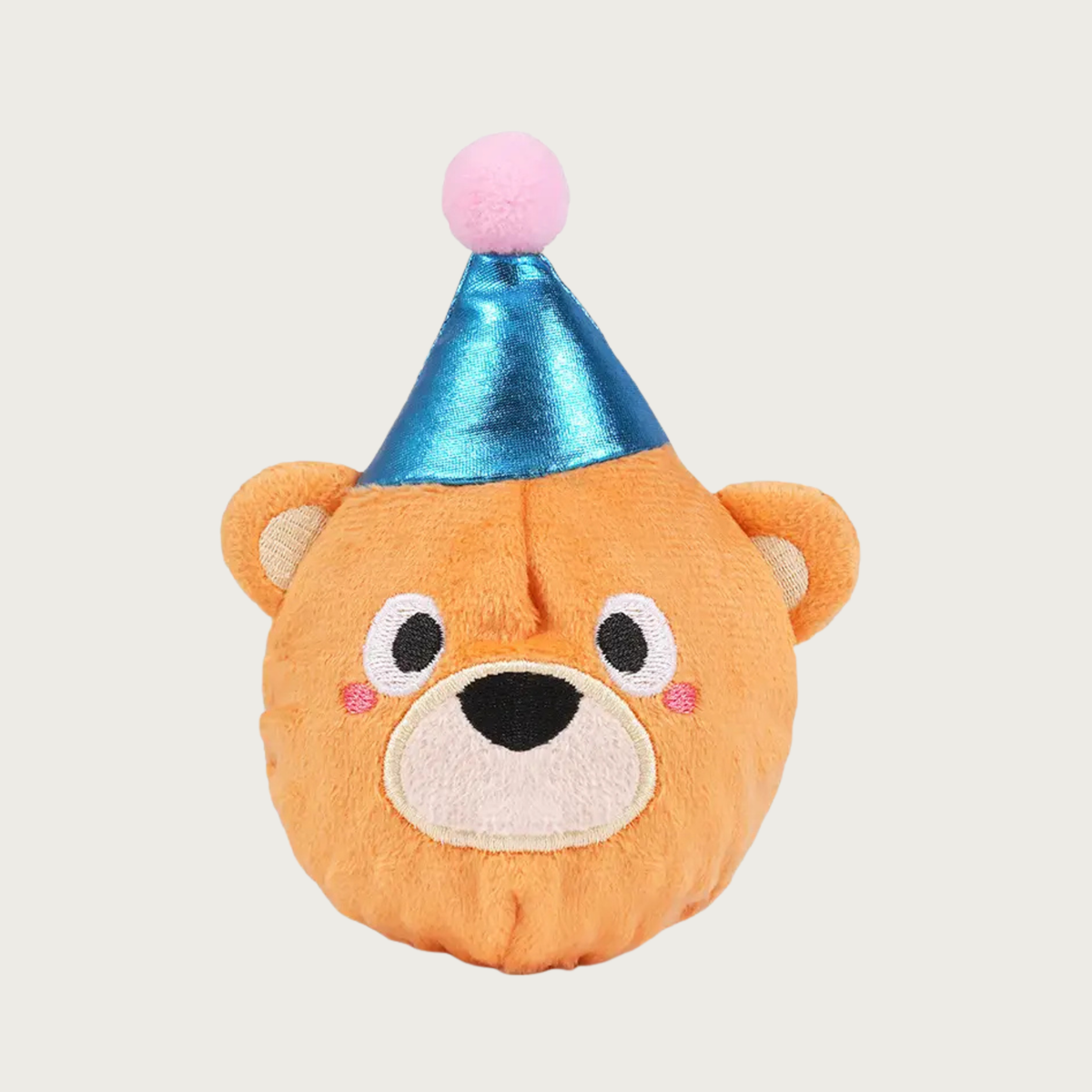 Birthday themed plush covered dog ball toy that looks like a teddy bear wearing a birthday hat. It has an embroidered face with neutral expression, and the hat is a shimmery blue color with pink pom pom.