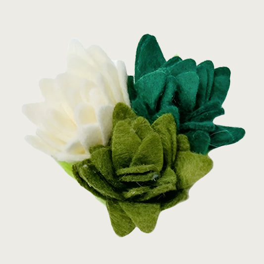 Dog collar accessory, that is a group of three felt, multi-layered "succulents" - one is cream, one is moss green, and one is hunter green.