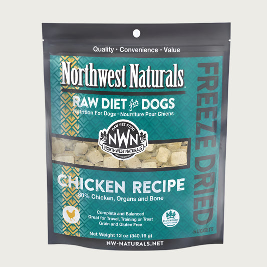 A 12 ounce bag of Northwest Naturals freeze-dried raw diet for dogs, chicken recipe. Clear window on bag shows small cube-sized nuggets.