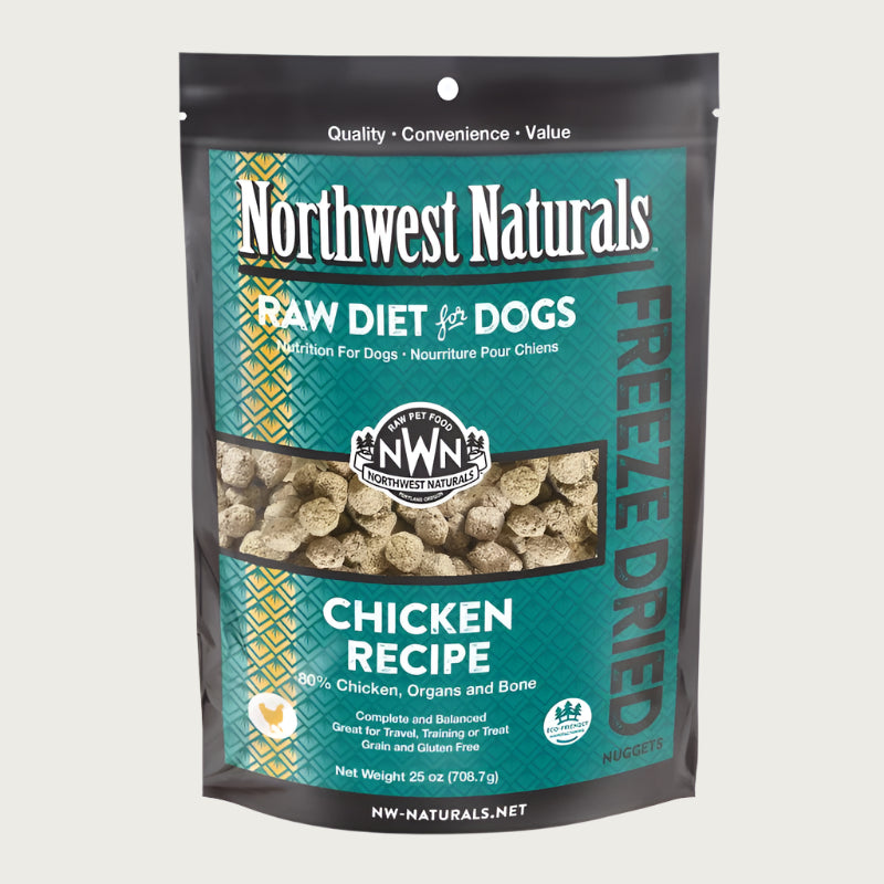 A 25 ounce bag of Northwest Naturals freeze-dried raw diet for dogs, chicken recipe. Clear window on bag shows small cube-sized nuggets.