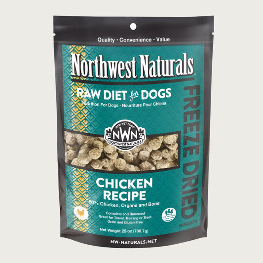A 25 ounce bag of Northwest Naturals freeze-dried raw diet for dogs, chicken recipe. Clear window on bag shows small cube-sized nuggets.
