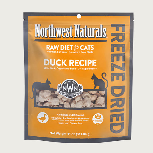 An 11 ounce bag of Northwest Naturals freeze-dried raw diet for cats, duck recipe. Clear window on bag shows small bite-sized nibbles.