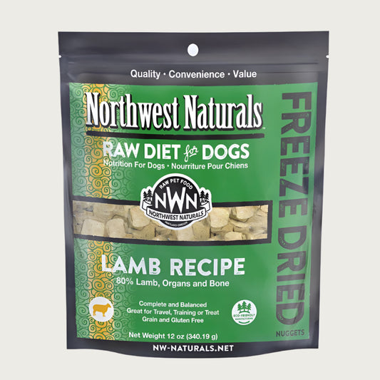 A 12 ounce bag of Northwest Naturals freeze-dried raw diet for dogs, lamb recipe. Clear window on bag shows small cube-sized nuggets.