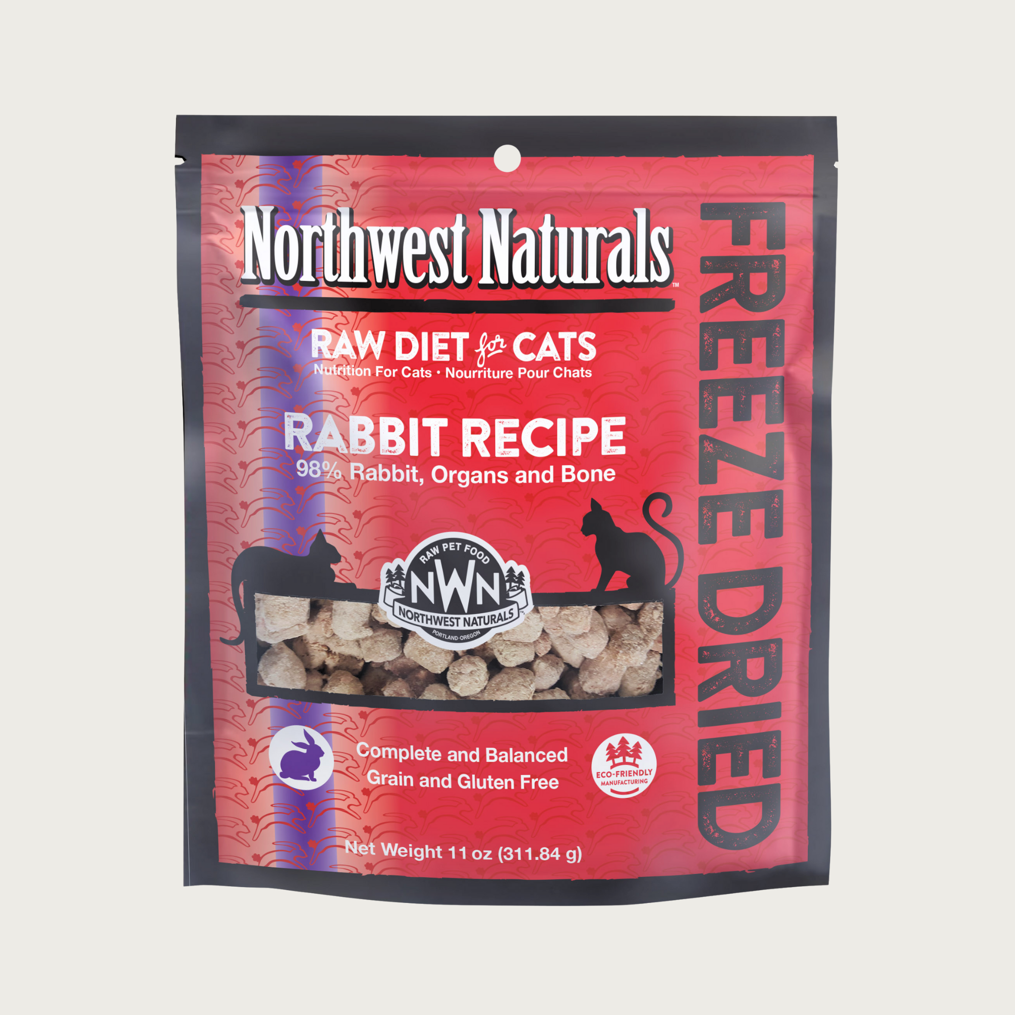 An 11 ounce red bag of Northwest Naturals freeze-dried raw diet for cats, rabbit recipe. Clear window on bag shows small bite-sized nibbles.