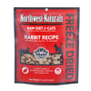 An 11 ounce bag of Northwest Naturals freeze-dried raw diet for cats, rabbit recipe. Clear window on bag shows small bite-sized nibbles.