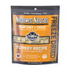 A 12 ounce bag of Northwest Naturals freeze-dried raw diet for dogs, turkey recipe. Clear window on bag shows small cube-sized nuggets.