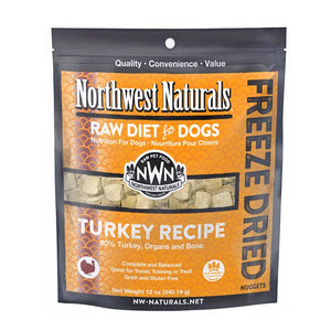 A 12 ounce bag of Northwest Naturals freeze-dried raw diet for dogs, turkey recipe. Clear window on bag shows small cube-sized nuggets.
