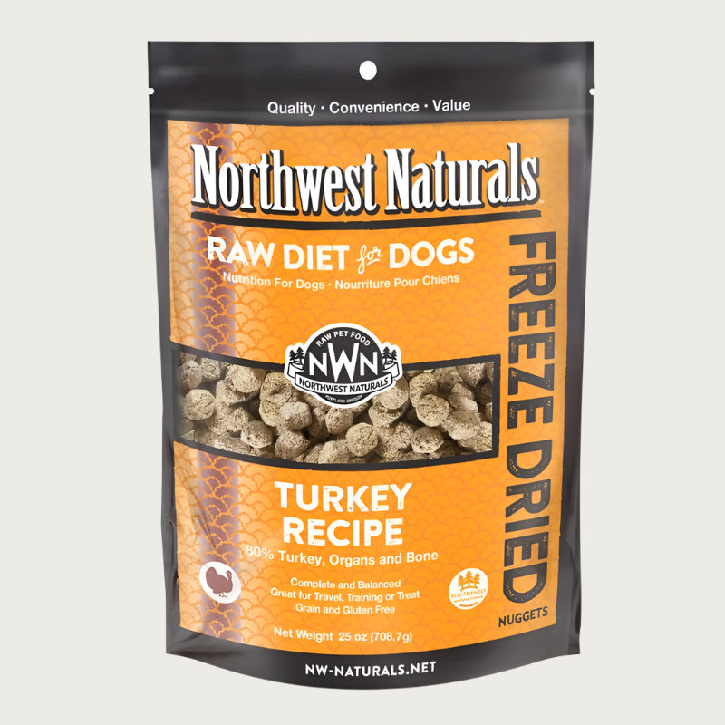 A 25 ounce bag of Northwest Naturals freeze-dried raw diet for dogs, turkey recipe. Clear window on bag shows small cube-sized nuggets.