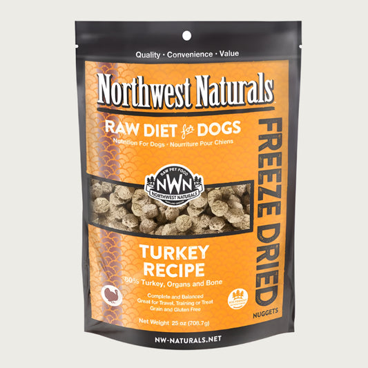 A 25 ounce bag of Northwest Naturals freeze-dried raw diet for dogs, turkey recipe. Clear window on bag shows small cube-sized nuggets.