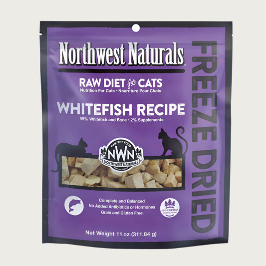 An 11 ounce bag of Northwest Naturals freeze-dried raw diet for cats, whitefish recipe. Clear window on bag shows small bite-sized nibbles.