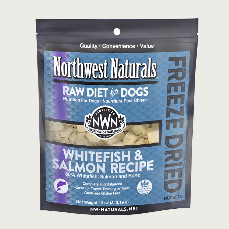 A 12 ounce bag of Northwest Naturals freeze-dried raw diet for dogs, whitefish and salmon recipe. Clear window on bag shows small cube-sized nuggets.