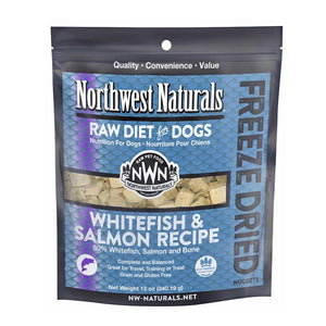 A 12 ounce bag of Northwest Naturals freeze-dried raw diet for dogs, whitefish and salmon recipe. Clear window on bag shows small cube-sized nuggets.
