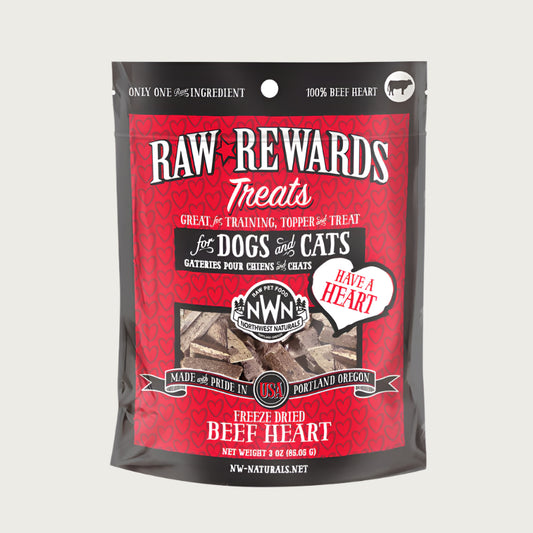 A 3 ounce bag of Northwest Naturals freeze-dried raw beef heart treats for dogs and cats. Clear window on bag shows small rectangular shaped pieces.