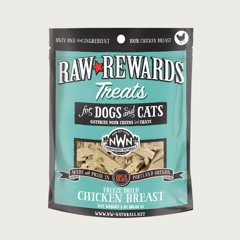 A 3 ounce bag of Northwest Naturals freeze-dried raw chicken breast treats for dogs and cats. Clear window on bag shows small rectangular shaped pieces.