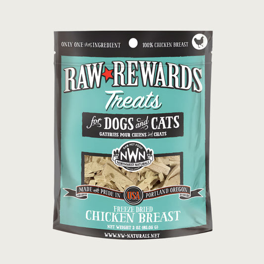 A 3 ounce bag of Northwest Naturals freeze-dried raw chicken breast treats for dogs and cats. Clear window on bag shows small rectangular shaped pieces.