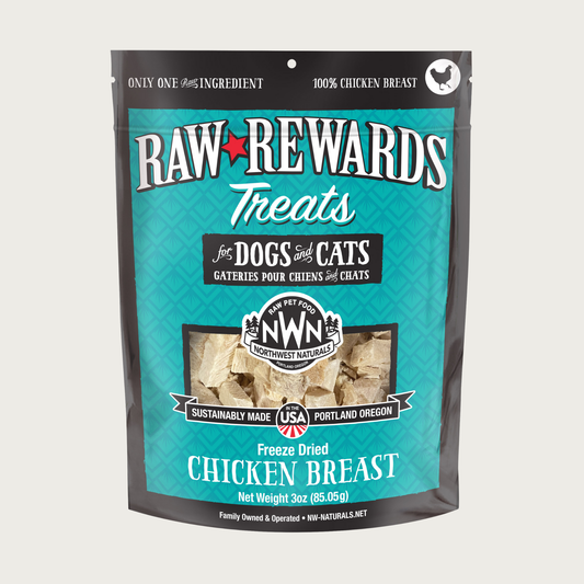 A 3 ounce teal bag of Northwest Naturals freeze-dried raw chicken breast treats for dogs and cats. Clear window on bag shows small rectangular shaped pieces.