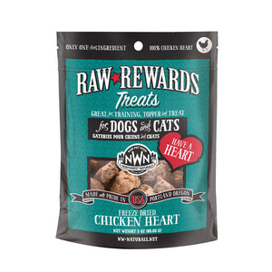 A 3 ounce bag of Northwest Naturals freeze-dried raw chicken heart treats for dogs and cats. Clear window on bag shows small rectangular shaped pieces.