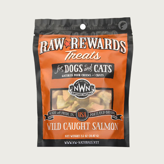 A 2.5 ounce bag of Northwest Naturals freeze-dried raw salmon treats for dogs and cats. Clear window on bag shows small rectangular shaped pieces.