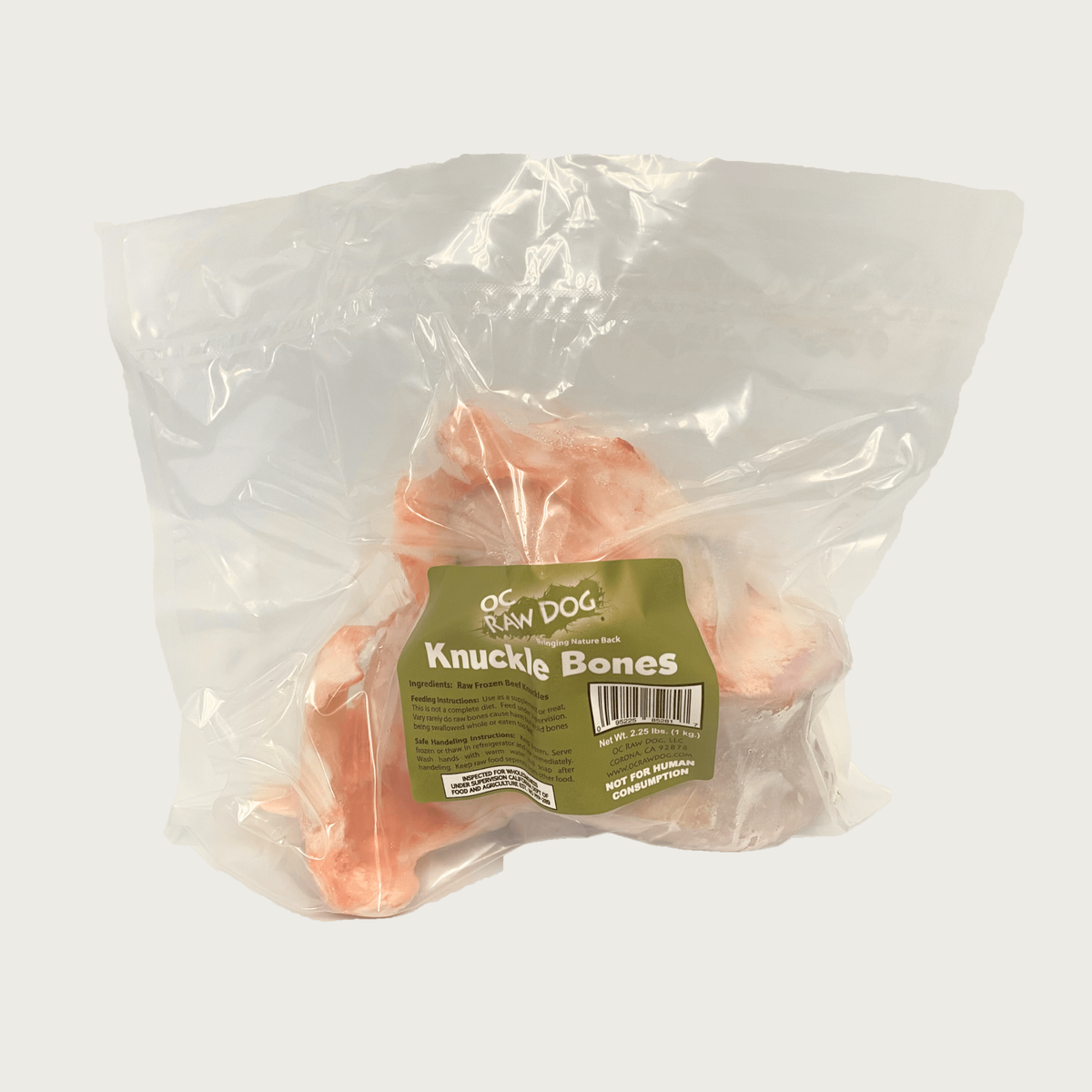 OC Raw Dog, shrink wrapped, clear plastic bag containing raw beef knuckle bones inside. 2.25 lbs. Not for human consumption.