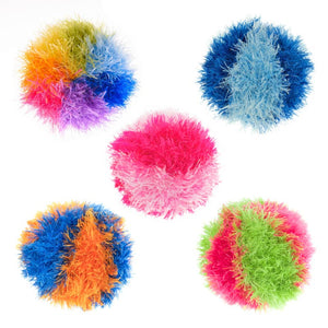 A group of five, different colored OoMaLoo Ball dog toys. They are covered in longer fabric strands (about 1" long) that look fuzzy, like hair. The color options are: rainbow, light blue/dark blue, pink/hot pink, blue/orange, and green/hot pink.