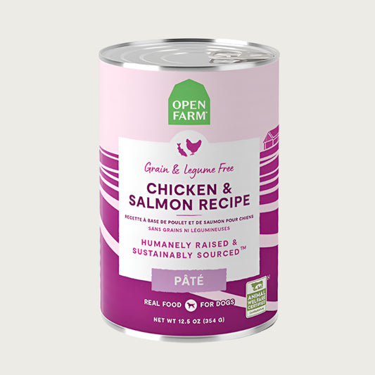 A 12.5 oz can of Open Farm Chicken & Salmon Recipe Pate dog food. Grain & legume free, Humanely Raised & Sustainably Sourced. Animal Welfare Certified.