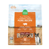 A 13.5 oz bag of Grain Free, Open Farm Freeze-Dried-Raw Farmer's Table Pork Recipe dog food. Meal or Mixer, Humanely raised and sustainably sourced. A photo of a Border Collie dog standing in a field on a farm covers the bag, with an orange bar in the center to highlight the white text over it.