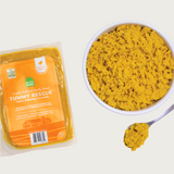 A close-up bowl of Open Farm's Gently Cooked Tummy Rescue recipe, showing an orangey-beige colored, well blended & smooth food.