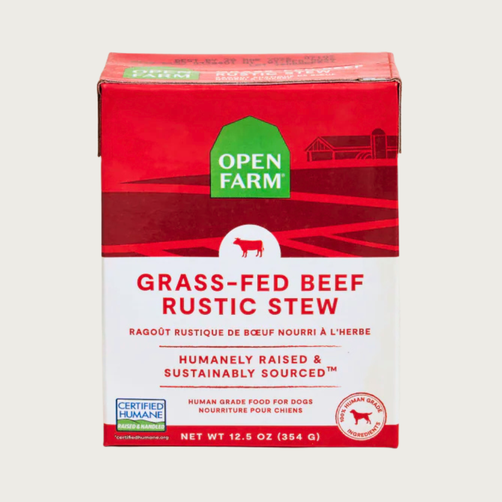 A 12.5 oz red and white carton of Open Farm Grass-Fed Beef Rustic Stew dog food. 100% Human Grade Ingredients. With Certified Humane beef.