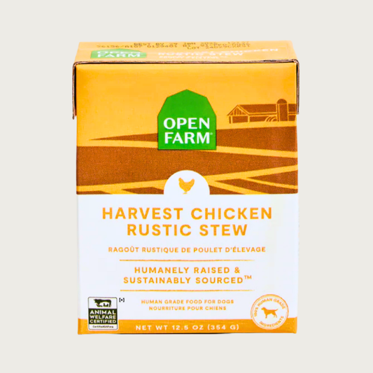 A 12.5 oz yellow and white carton of Open Farm Harvest Chicken Rustic Stew dog food. 100% Human Grade Ingredients. With Animal Welfare Certified chicken.