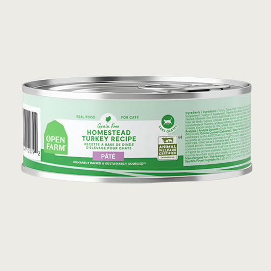 A 2.8 oz can of Open Farm Homestead Turkey Recipe Pate cat food. Grain & legume free, Humanely Raised & Sustainably Sourced. Animal Welfare Certified.