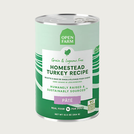 A 12.5 oz can of Open Farm Homestead Turkey Recipe Pate dog food. Grain & legume free, Humanely Raised & Sustainably Sourced. Animal Welfare Certified.