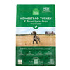 A bag of Open Farm Turkey & Ancient Grains Recipe dog food. Humanely raised and sustainably sourced. A photo of a Pointer dog standing in a field on a farm is in the center 1/3 of the bag, with a green band on the top 1/3 and bottom 1/3 behind white text to highlight it.