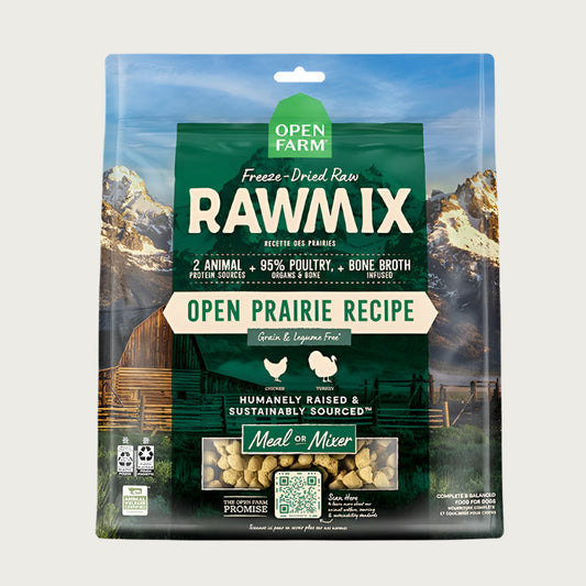 A 13.5 oz bag of Open Farm RawMix Freeze-Dried Raw Open Prairie Recipe dog food. 2 animal protein sources, 95% poultry, organs & bone, bone broth infused. Humanely raised and sustainably sourced. A mountain ranch scene is in the background of the bag, with a vertical green bar behind the white text to highlight it.