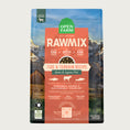 Load image into Gallery viewer, A bag of Open Farm RawMix Grain Free Tide & Terrain Recipe dog food. Humanely raised and sustainably sourced. A mountain ranch scene is in the background of the bag, with a vertical orange bar behind the white text to highlight it.
