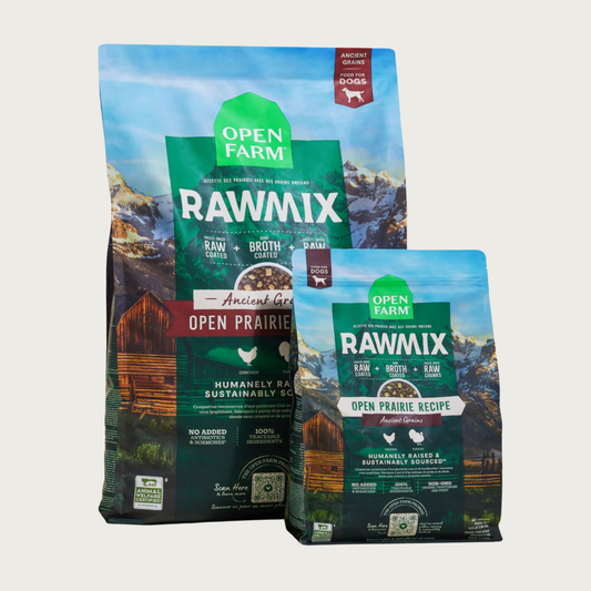Two packages of Open Farm Rawmix Open Prairie Ancient Grains recipe dog food. The 3.5lb bag is standing in front of the 20lb bag.