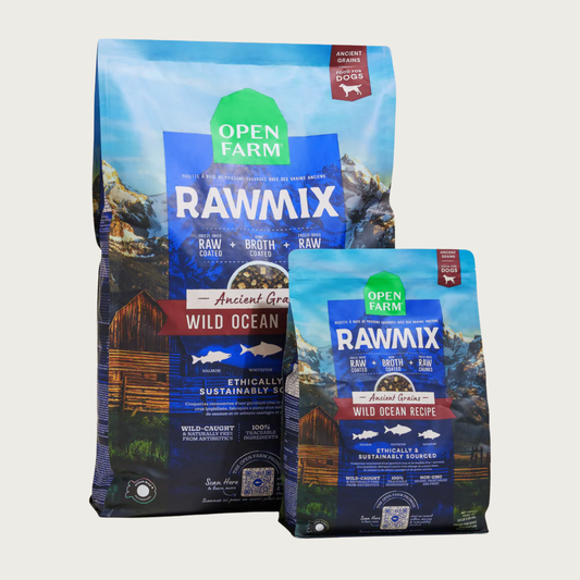 Two packages of Open Farm Rawmix Wild Ocean Ancient Grains recipe dog food. The 3.5lb bag is standing in front of the 20lb bag.