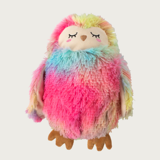 Plush owl dog toy covered in brightly colored faux fur. It has embroidered facial details and brown feet.