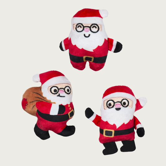 Three mini plush dog toys shaped like Santa Claus in three different poses.