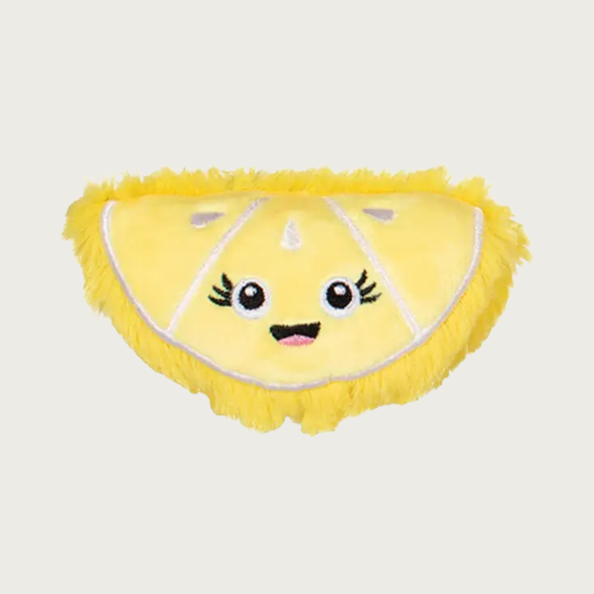 Yellow plush lemon wedge-slice shaped dog toy with an embroidered smiley face.