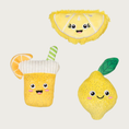 Load image into Gallery viewer, Three plush dog toys with a lemon theme, all with embroidered cute smiley faces. There is a yellow lemon wedge slice, a yellow whole lemon with a green leaf, and a yellow glass of lemonade with a green & white striped straw and lemon slice accent.
