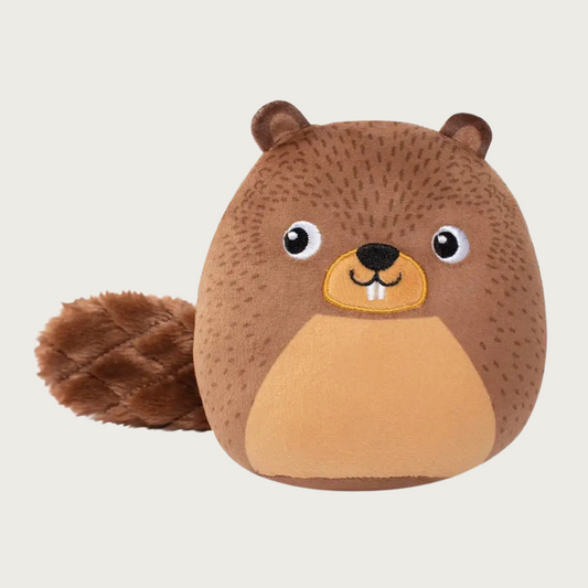 Plush dog toy shaped like a beaver. Its round body is 2 shades of brown, with small round ears and flat, faux-fur wide tail. Cute embroidered facial details include 2 buck teeth.