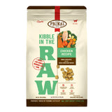 A 1.5 pound bag of chicken recipe Kibble in the Raw dog food from Primal Pet Foods. Text on bag reads "Kibble sized bites made with freeze-dried raw chicken" and "Serve like kibble. Nourish like raw." There is an image of fresh produce with a raw chicken breast, and a smaller image of the bite-sized morsels that are in the bag.