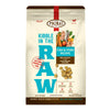A 1.5 pound bag of fish & pork recipe Kibble in the Raw dog food from Primal Pet Foods. Text on bag reads "Kibble sized bites made with freeze-dried raw fish & pork" and "Serve like kibble. Nourish like raw." There is an image of fresh produce with raw pork chops and whole fish, and a smaller image of the bite-sized morsels that are in the bag.