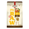 A 1.5 pound bag of puppy recipe Kibble in the Raw dog food from Primal Pet Foods. Text on bag reads "Kibble sized bites made with freeze-dried raw chicken & pork" and "Serve like kibble. Nourish like raw." There is an image of fresh produce with a raw chicken breast and pork chop, and a smaller image of the bite-sized morsels that are in the bag.