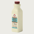 Load image into Gallery viewer, A 32 ounce plastic bottle of frozen Primal raw goat milk original recipe for dogs and cats of all life stages, with probiotics for digestive support.
