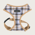 Load image into Gallery viewer, Plaid dog harness with a white base color, with black, navy blue, and tan plaid with tan trim on edges, with a black & white Puppia label in the center of the chest.
